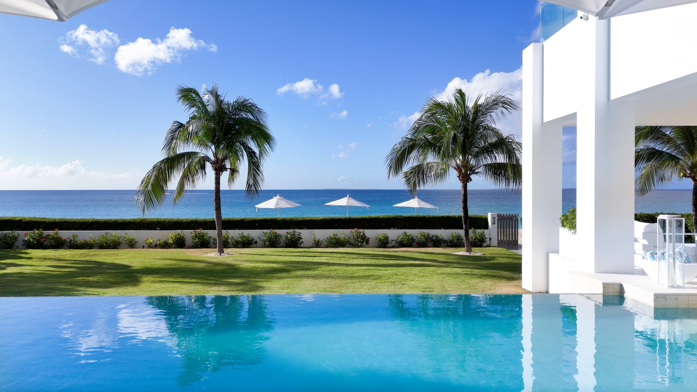Beach House patio with tropical views